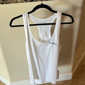 Size 8 white lululemon love tank from Hawaii.